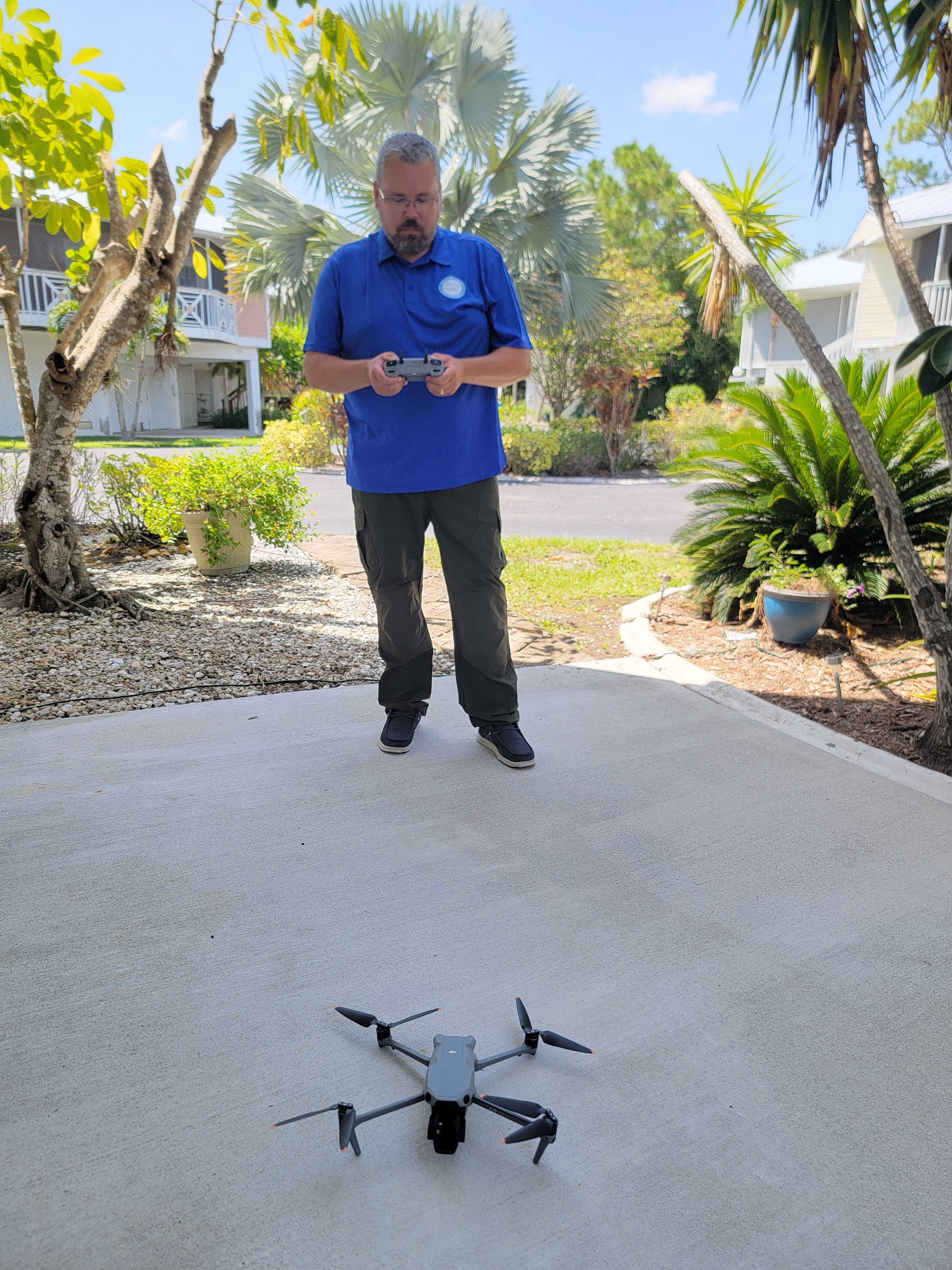 Inspector flying drone for wind mitigation roof inspection